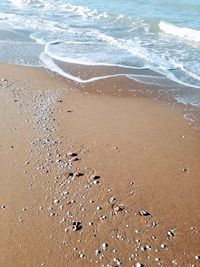 High angle view of sand on beach
