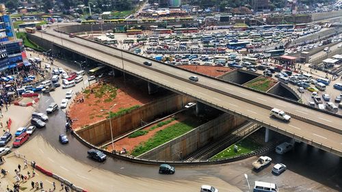 High angle view of vehicles on highway in city