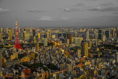 Aerial view of cityscape against sky