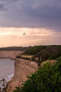 Scenic view of sea against sky at sunset