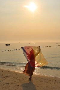 Scenic view of sea at sunset
