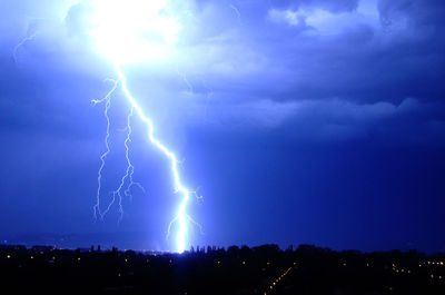 Lightning in sky at night