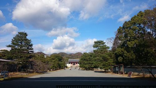 View of mountain road against cloudy sky