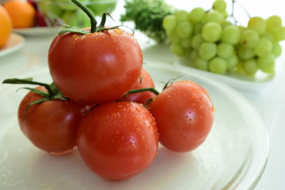 Close-up of fruits in plate on table