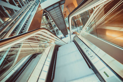 Low angle view of escalator in building