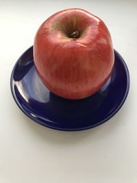 High angle view of apple on table