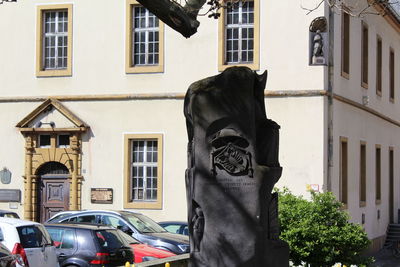 Close-up of statue on city street