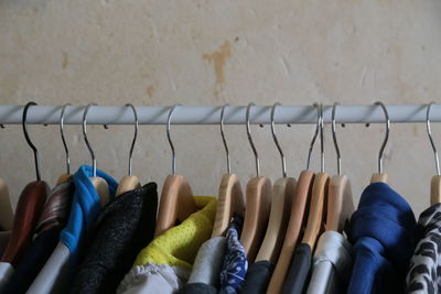 Close-up of multi colored clothes hanging on floor