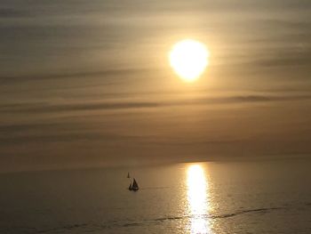 Scenic view of sea at sunset