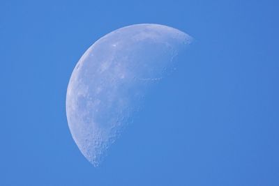 Close-up of crescent moon in clear blue sky