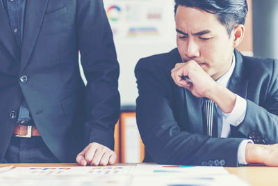 Business people working at desk in office