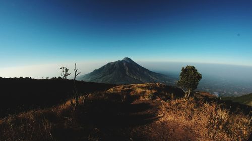 Scenic view of mountains against clear sky