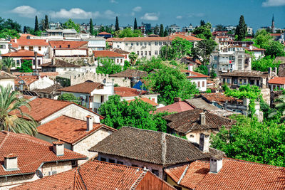 Houses in town against sky