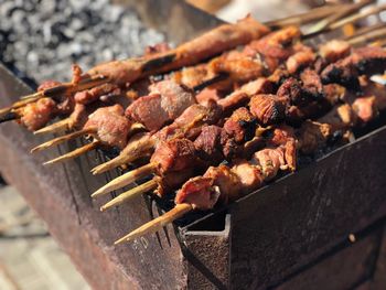 High angle view of meat on barbecue grill