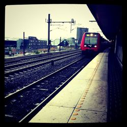 Train on railroad station platform