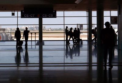 Silhouette people at airport