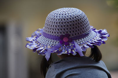 Rear view of woman wearing hat