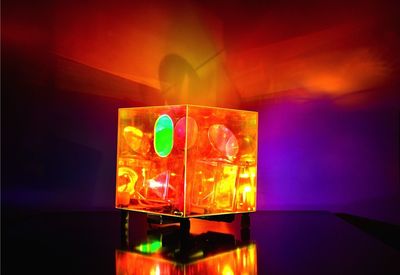 Lit lamp in dark room