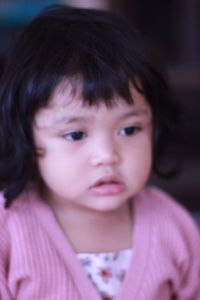 Close-up portrait of cute girl