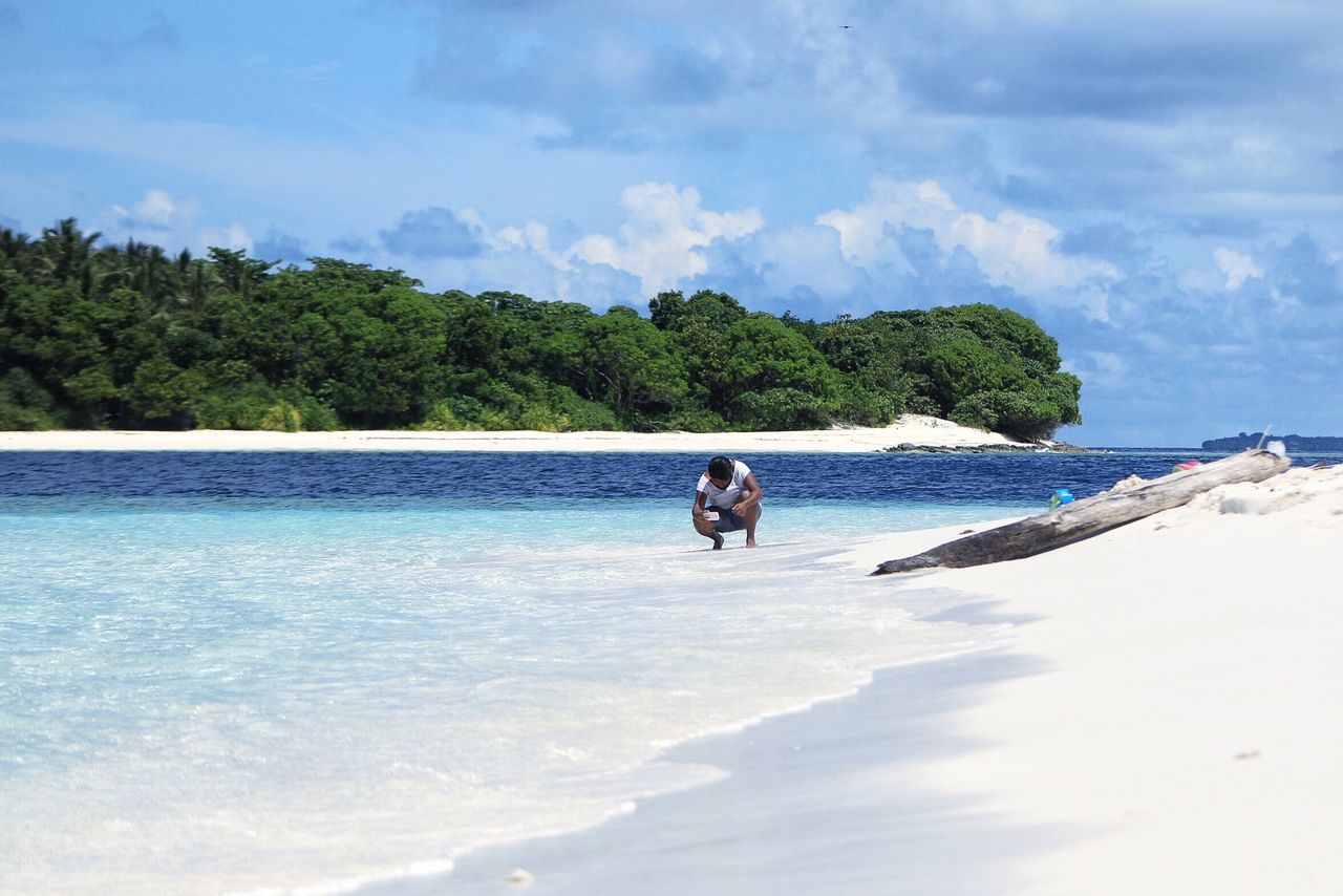 water, sea, leisure activity, beach, lifestyles, sky, vacations, scenics, beauty in nature, men, nature, cloud - sky, shore, tranquility, sand, tranquil scene, enjoyment