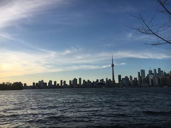 Scenic view of sea and buildings against sky