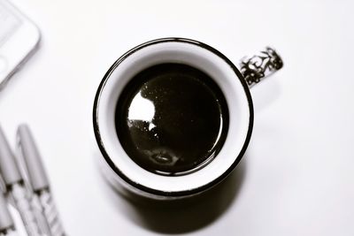 Directly above shot of black coffee on table