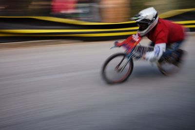 Sportsman racing motor vehicle on track