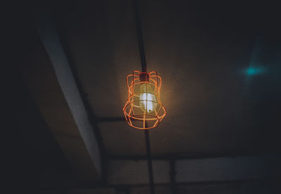 Low angle view of illuminated pendant light