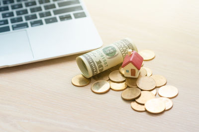 High angle view of coins on table