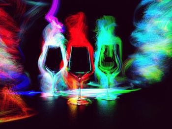 Close-up of light painting against black background