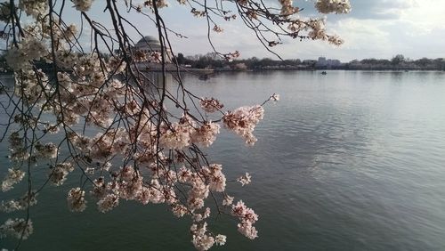 Scenic view of lake against sky at sunset