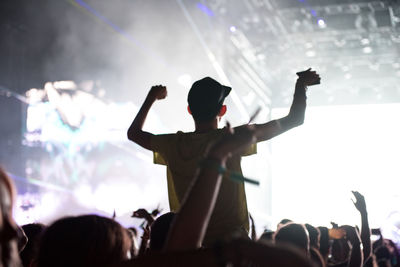 People enjoying at music concert