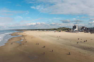 View of beach against cloudy sky