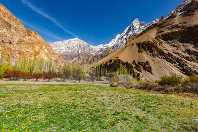 Scenic view of snowcapped mountains against sky