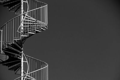 Spiral staircase against clear sky