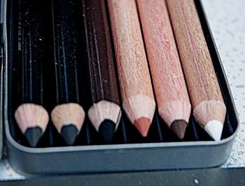 High angle view of multi colored pencils on table