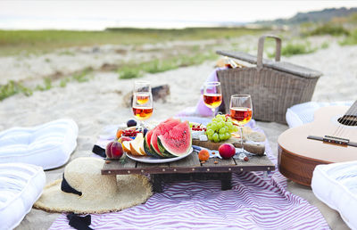 High angle view of breakfast on table at beach