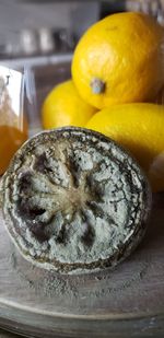 Close-up of lemon on table