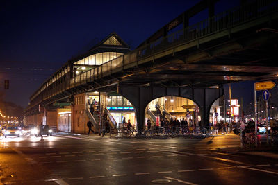 View of bridge in city at night