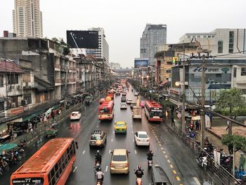 High angle view of traffic on city street and buildings