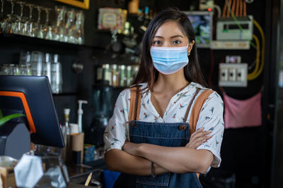 Portrait of a woman working at cafe