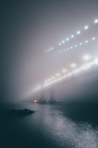 Scenic view of sea against sky during foggy weather