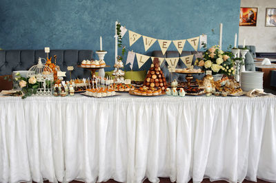 Panoramic shot of food on table against wall