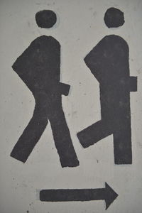 Close-up of arrow sign