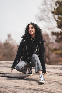 Portrait of smiling young woman in winter