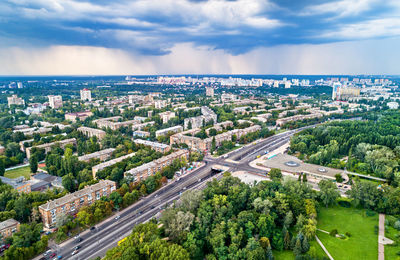 High angle view of road amidst buildings in city