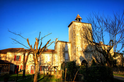 Low angle view of old building against sky