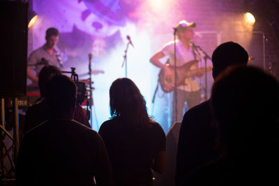 Group of people at music concert