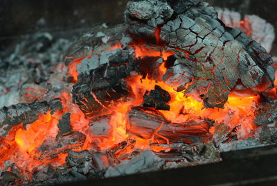 High angle view of bonfire on wood