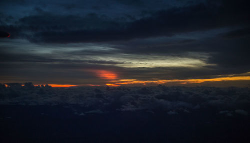 Scenic view of landscape against cloudy sky